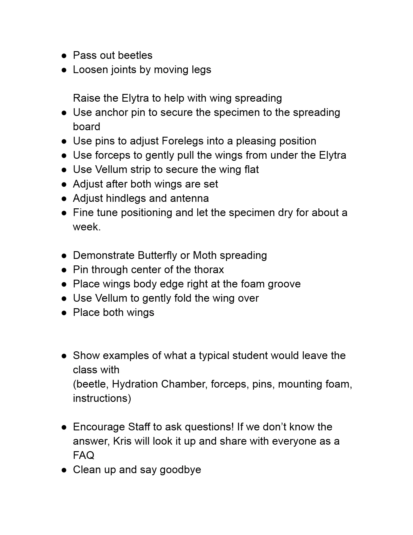 Staff spreading class handout, page 2